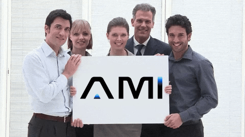 AM InfoWeb team members holding the AMI logo, representing collaboration, people-first culture, and client-focused operations.